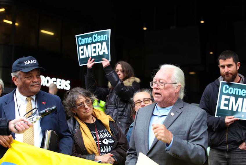Kent Bailey, the chair of the Tampa Sierra Group speaks on behalf of a small group of protesters from Florida outside the the Emera Inc. annual meeting at Halifax Convention Centre Wednesday. The community advocates travelled from Florida. They were protesting continued use of carbon-based fuels by Emera subsidiary TECO Energy, based in Tampa, in its Big Bend Power Station.