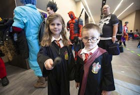 Little Hermione Granger (Claire Dickey, 6) and Harry Potter (Keigan Dickey, 4), are dressed up for the ninth annual Hal-Con sci-fi and gaming convention.