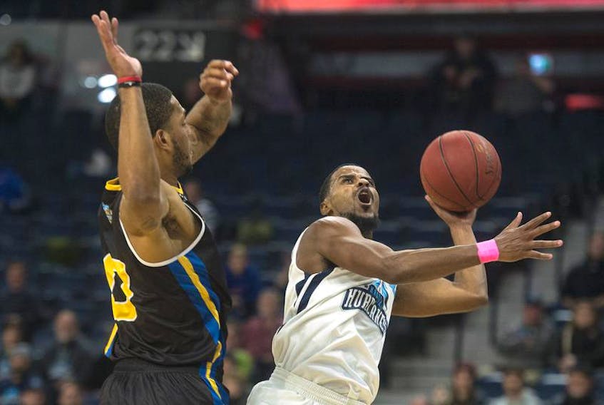 Halifax Hurricanes guard Cliff Clinkscales shoots the ball after getting fouled by Saint John Riptide guard Tyquane Goard during Thursday’s game at the Scotiabank Centre.