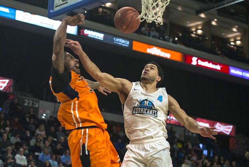 Halifax Hurricanes guard Malcolm Duvivier fouls Island Storm guard Alex Campbell during the first half of Thursday night’s NBL Canada game at the Scotiabank Centre.