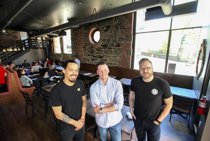 Bryan Tanaka, left, Ryan Wolfe, and Lawry Deneau are co-owners of Julep Kitchen restaurant which is set to open Wednesday, at the corner of Barrington and Prince streets in downtown Halifax.