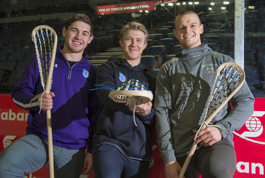 Rochester Knighthawks players Jake Withers, Kyle Jackson and Graeme Hossack pose for a photo at the Scotiabank Centre on Thursday. The players were joined by teammate Cody Jamieson and assistant coach Jason Johnson for a VIP event for season tickets deposit holders on Thursday night.