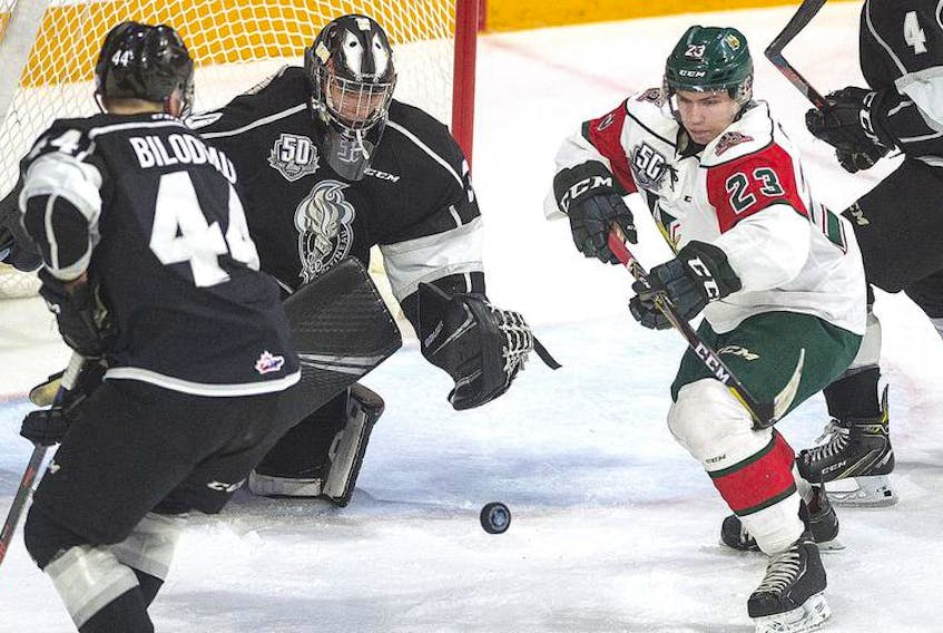 Halifax Mooseheads forward Keith Getson tries to corral a bouncing puck in front of Gatineau Olympiques goalie Creed Jones during the second period of Friday night’s QMJHL game at the Scotiabank Centre.