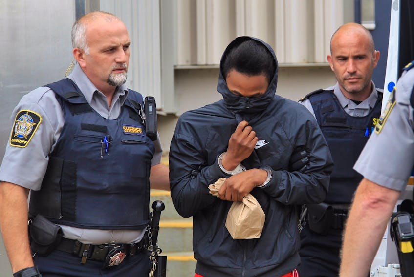 Rae’heem Downey is led out of the Dartmouth courthouse on Thursday, Aug. 2, 2018 after his arraignment on a charge of first-degree murder in the June 18 shooting of Jamie Lee Bishop in Eastern Passage.