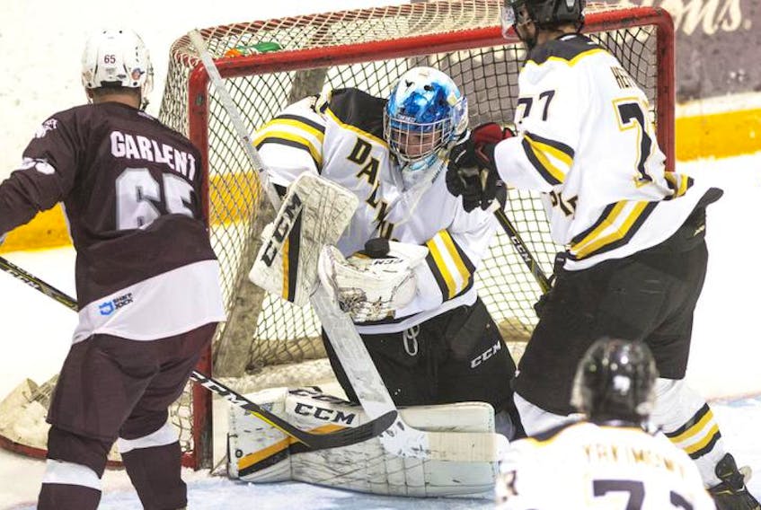 Dalhousie Tigers first-year goalie Reilly Pickard makes a save during an AUS men's hockey game against the Saint Mary’s Huskies last Friday at the Halifax Forum.