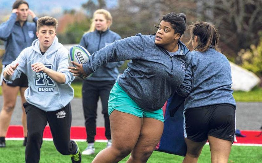 Prop forward Joanna Alphonso and her St. F.X. teammates practised at King’s-Edgehill School in Windsor on their way to Acadia, where the Axewomen host the U Sports national rugby championship, beginning Thursday morning.