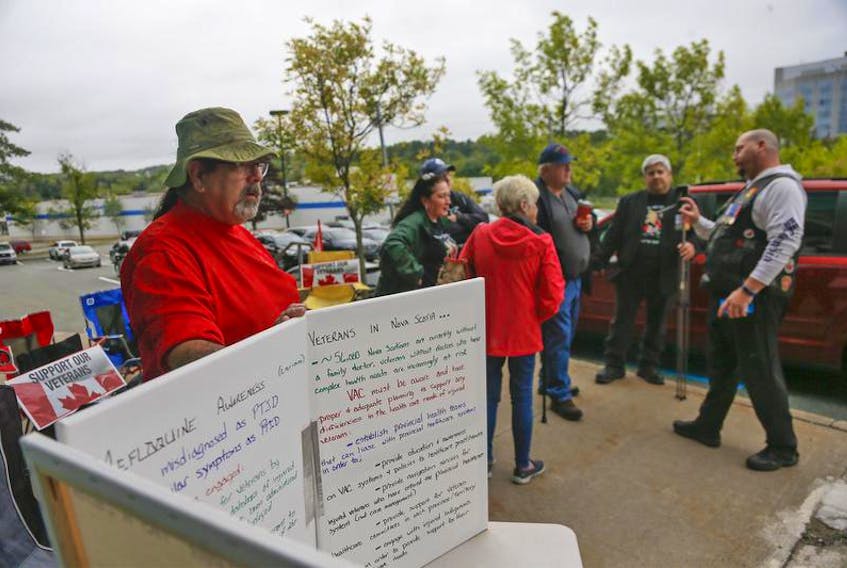 Roger Pothier, left, and other veterans rallied in front of the the Halifax Veterans Affairs Canada Office in Halifax on Wednesday. They’re calling for an inquiry into the effects of the anti-malarial drug mefloquine, which has been prescribed to Canadian military members since 1992. - Tim Krochak