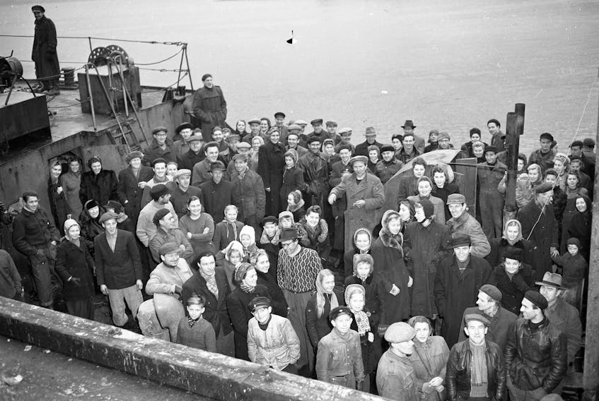 Some of the 347 Baltic refugees aboard the tiny ship Walnut as they arrive in Halifax from Gothenburg, Sweden.
