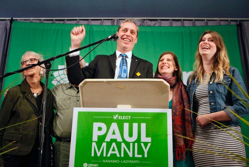 The Green Party’s Paul Manly celebrates after voting results come in for the Nanaimo-Ladysmith byelection on May 6, 2019.