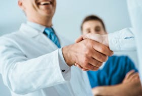 Stock photo of doctors shaking hands.