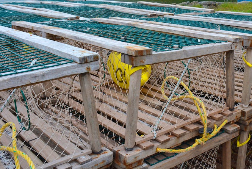 Lobster traps stacked near the water in Grand Etang Harbour, Inverness County, N.S. in 2015.