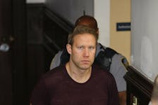 Matthew Ross Lambert of Richmond, B.C., is shown at Halifax provincial court July 3 after his arrest in connection with a cocaine seizure. He now faces a new charge of money laundering. - Eric Wynne