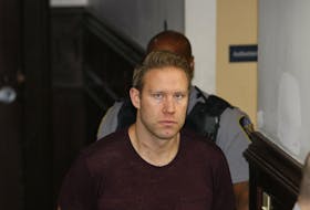 Matthew Ross Lambert of Richmond, B.C., is shown at Halifax provincial court July 3 after his arrest in connection with a cocaine seizure. He now faces a new charge of money laundering.