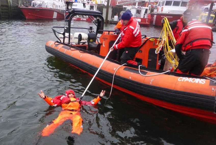 Scientist Paul Brodie is shown testing what he calls a one-of-of-a-kind PFD in the Bedford Basin recently. Made of innovative, light-weight material, the survival suit offers fishermen a much-needed alternative to conventional PFDs, says Brodie.