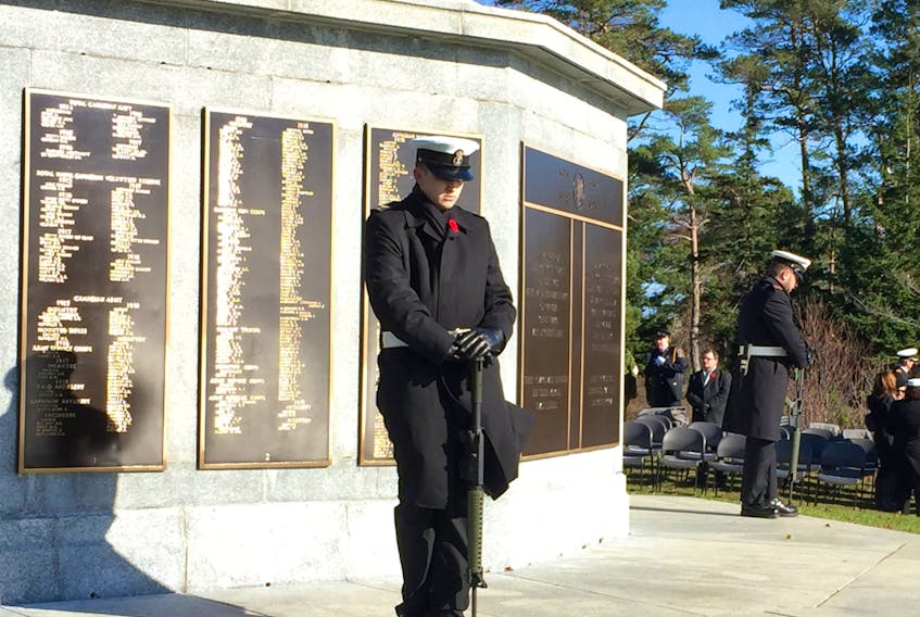 Sentries take their positions before the HMCS Scotian Remembrance Day ceremony at the Sailor's Memorial in Point Pleasant Park on Saturday, Nov. 11, 2017.