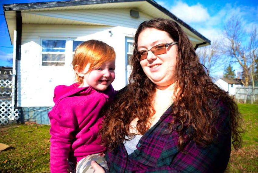 Sahara Beairsto and her mother Macayla are picture in Brule on Friday. Sahara, 2, is the subject of a complex international custody dispute between her mother and father.