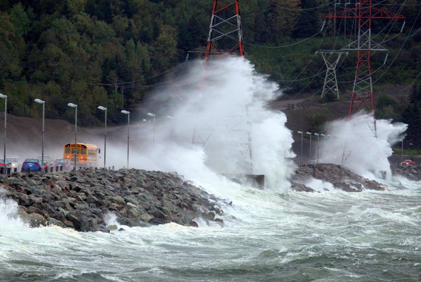 A school bus crosses over the Canso Causeway through storm surge on Oct. 5, 2011.  - Jack Ronalds/File