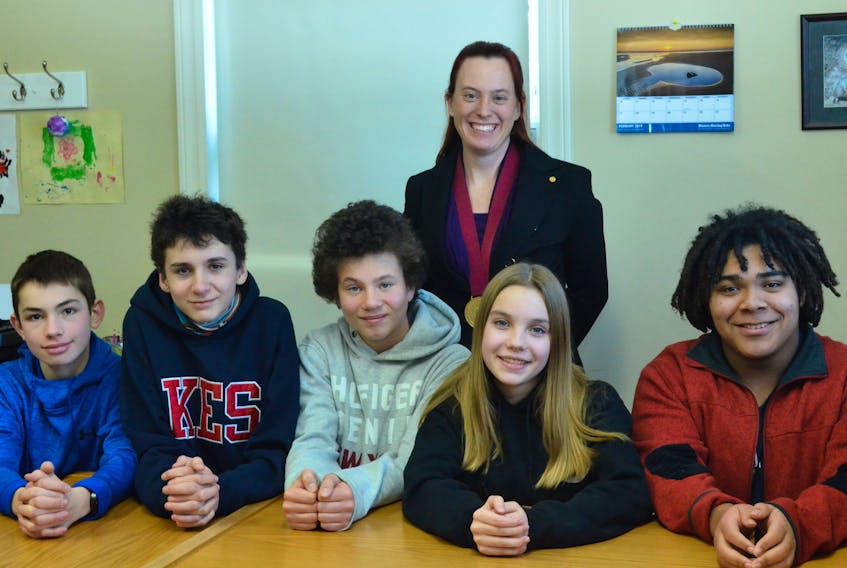 Governor-General's Award-winning Booker School teacher Temma Frecker with former students, Forrest Robinson, Henry Mulherin, Colin Stephens, Hana Hutchinson and Will Mercer, who last year developed a proposal on how to handle the controversial Cornwallis Statue in Halifax. Not pictured is student Abby Welton.