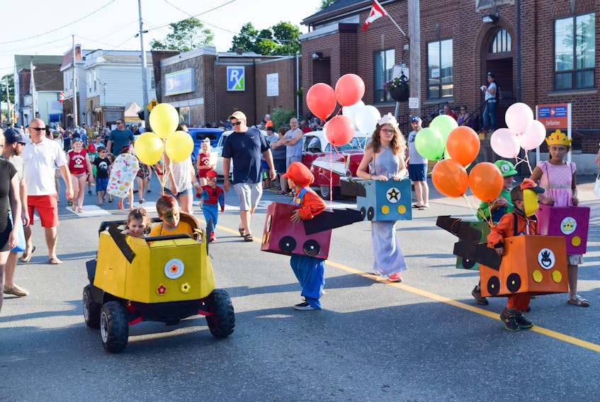 The Stellarton Homecoming Children's Parade was held Friday, July 26. At the same time the street was closed off and antique cars were parked along Foord Street.