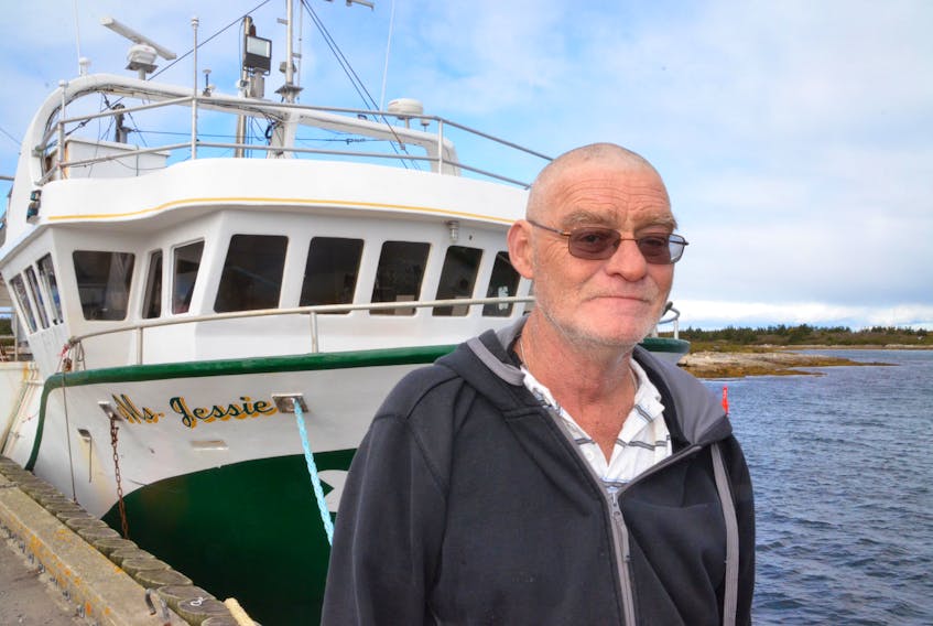 Capt. John Baker of Canso lost his wallet when his dragger, The Gentle Lady, went down in 2013. The wallet was recently brought up in the drag of the same boat that rescued them that night.