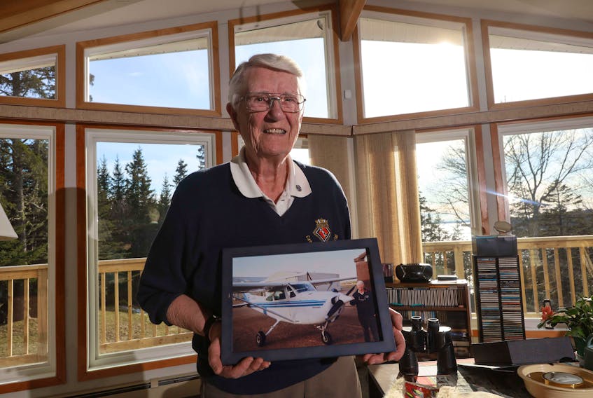 On March 6, 2020, Sherry Richardson holds a 2014 photograph of her favourite airplane, the Cessna 172 — a four-seat, single-engine, fixed-wing aircraft. She received her pilot’s licence when she was 76. She is now 83 and still flies.