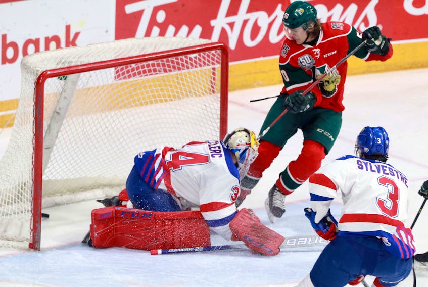 Halifax Mooseheads winger Raphael Lavoie jams the puck past Moncton Wildcats goaltender Francis Leclerc early in the first period of Saturday's QMJHL playoff game at the Scotiabank Centre. The Mooseheads won 3-2 to take a 2-0 lead in their quarter-final series. (ERIC WYNNE/Chronicle Herald)