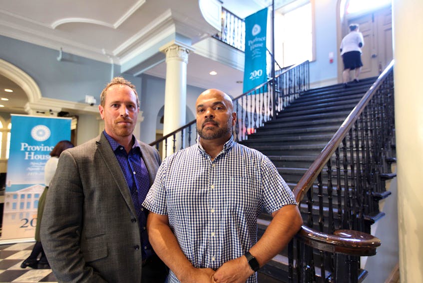 Rick Woodburn, left, senior prosecutor, and Perry Borden, senior crown attorney, both with Nova Scotia Prosecution Service, at the Nova Scotia Legislature on Wednesday, Oct. 16, 2019. Nova Scotia crown attorneys are in negotiations but Nova Scotia has denied them arbitration request as talks turn ugly.