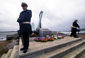 Two ceremonial sentries stands on the Bonaventure Anchor Memorial at Point Pleasant Park at the end of the 50th anniversary to commemorate the tragedy of HMCS Kootenay.