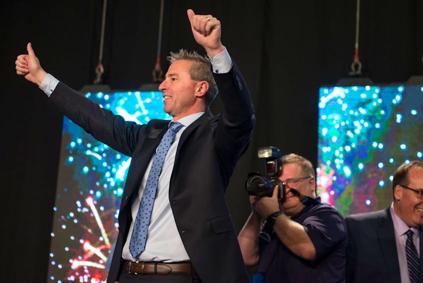 Tim Houston acknowledges the crowd at the Halifax Exhibition Centre after he was named the new leader of the Nova Scotia Progressive Conservative Party on Saturday afternoon.