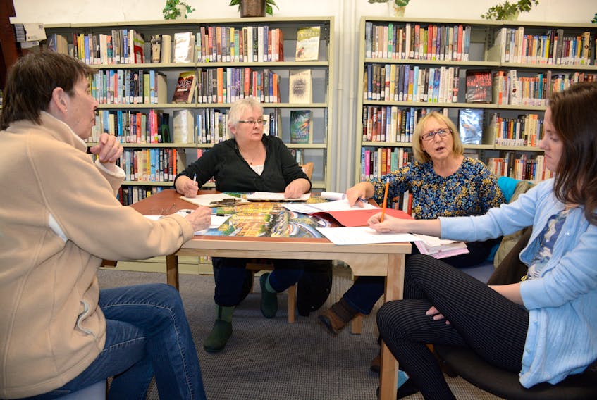 The Oxford Poetry Event Planning committee met for the first time at the Oxford Public Library Saturday afternoon. They are: (from left) Mary Ellen Stevenson, Eleanor Crowley, Ruthie Patriquin, and Megan McNutt. Patriquin is also the Community Economic Development Officer for the Town of Oxford and McNutt, taking notes of the meeting, is branch assistant at the Oxford Public Library.