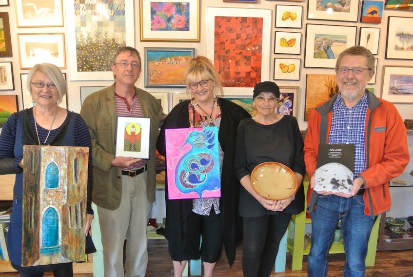 The Tidnish Bridge Art Gallery is open for another season on Highway 366 in the former visitor information centre and Chignecto Marine Ship Railway Interpretive Centre. Among the featured artists there this summer are: (from left) Cathy Thurston, Bob Morouney, Diana Vertis McIsaac, Melanie Landau and author Harry Thurston.