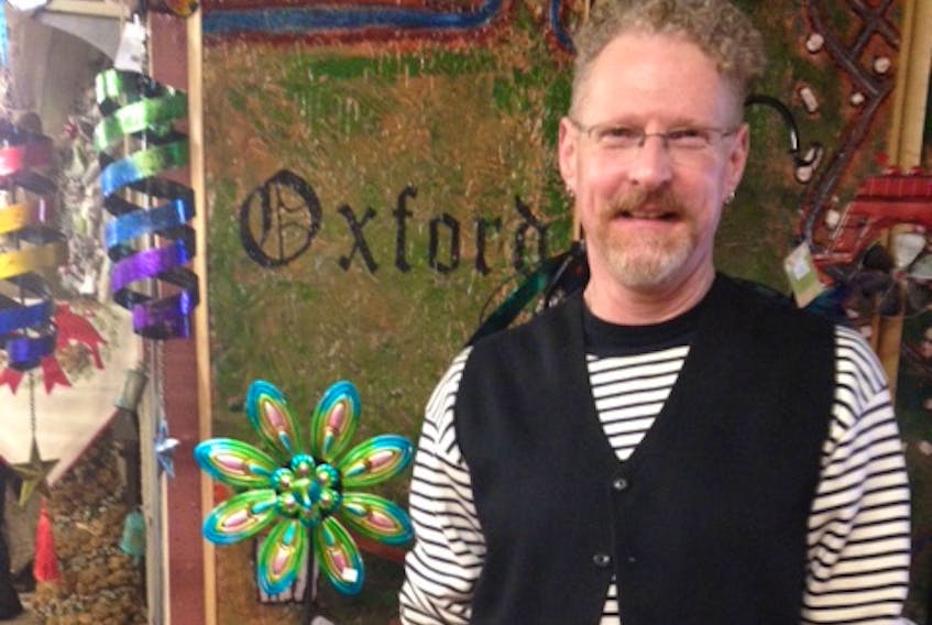 Eric Mosher of GJDE Enterprises is one of the Downtown Poetry locations on Saturday in Oxford.