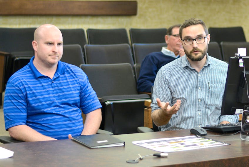 Scott Munroe (left), manager of facilities and parks for the Municipality of Cumberland County, and Nathan MacLeod, Urban and Landscape Designer with Architecture 49, took questions from county councilors about the Springhill Outdoor Recreation and Multi-Sport Complex during last week’s meeting of county council.