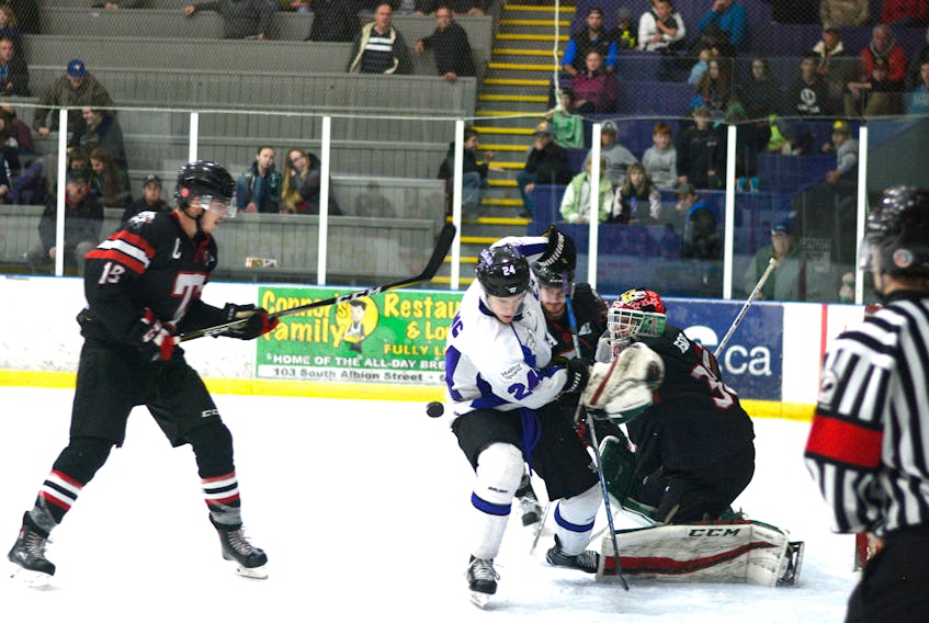 Jordan King swept behind the Bearcats defence and nearly scored on this shot during overtime action Saturday night at Amherst Stadium. King is in third place on the Maritime Hockey League’s point-board with 18 points, six goals and 12 assists.