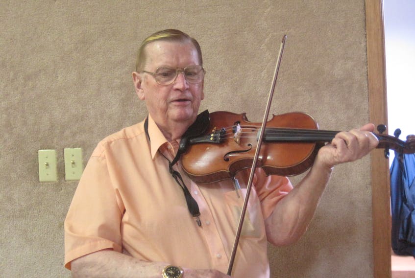 Dave Bagnell plays his fiddle at a Sunday Music Afternoon at the Wentworth Recreation Centre.