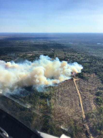 An aerial shot shows more than 20 hectares of land on fire in Chester Grant on Friday evening.