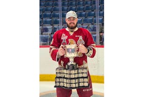 Zachary Bennett holds the top prize in Canadian junior hockey, the Memorial Cup.