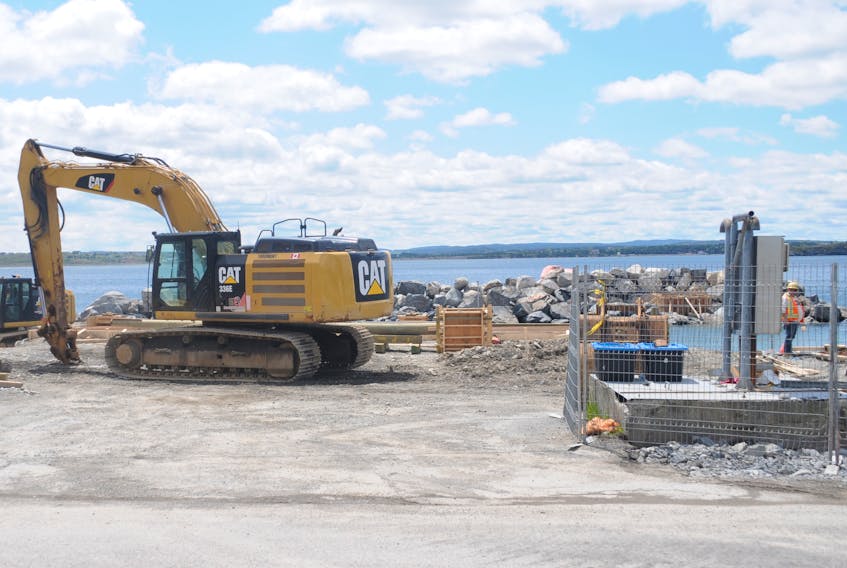 A new breakwater is in place in Spaniard's Bay to protect the public wharf. Work to reconstruct the wharf is underway but delays mean it won't be completed for this boating season.