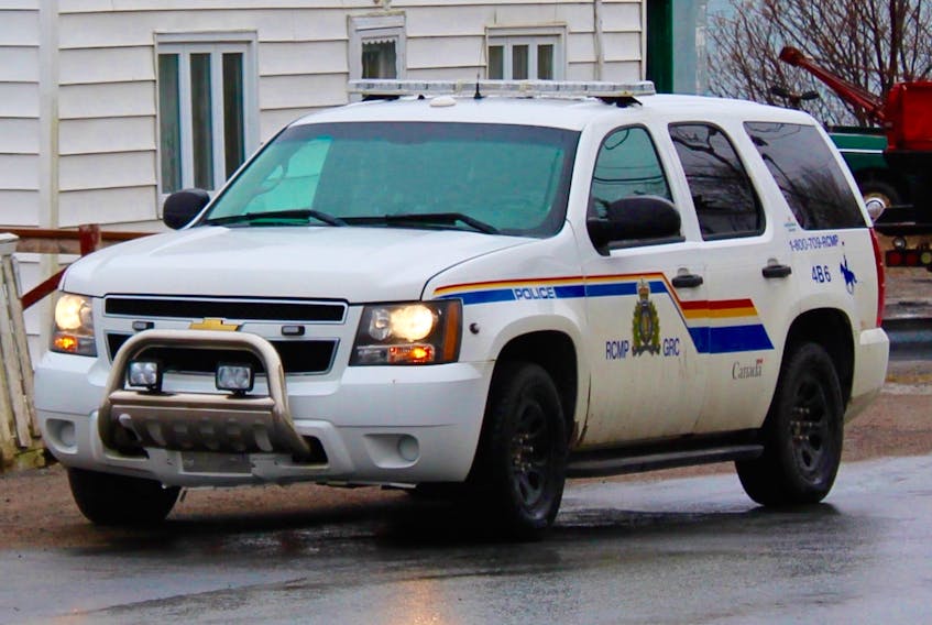 Harbour Grace RCMP executed a search warrant at a home on Water Street in Carbonear Friday morning, April 20. The home pictured directly behind the RCMP vehicle is not the one police searched that day.