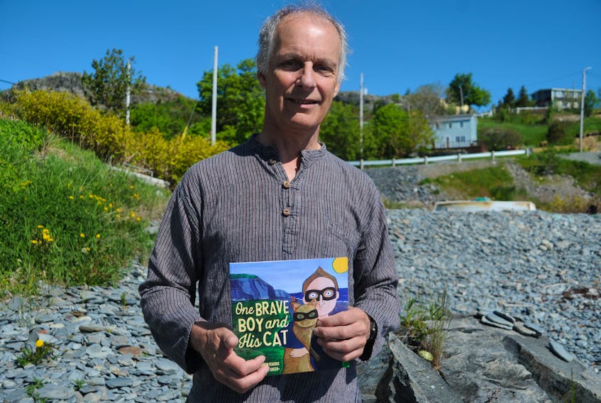 Retired veterinarian and author Andrew Peacock has veered off in a new direction with his latest book "One Brave Boy and His Cat." ANDREW ROBINSON/THE COMPASS