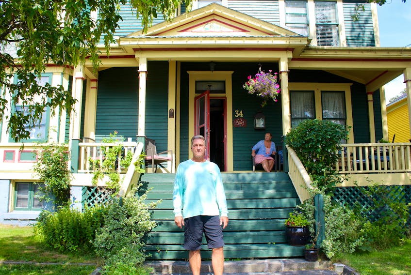 George Butler in front of the Rothesay House, a bed and breakfast he’s operated for the last 15 years in Harbour Grace.