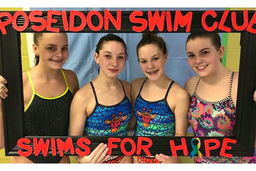 Showing off their Swim For Hope spirit are, from the left, Abby Trask, Rylee Moores, Mackenzie Sutton and Jorja Bennett.