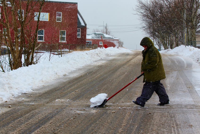 Residents of Carbonear found themselves busy dealing with an overnight snowfall Wednesday morning, and will be preparing for more later in the day.