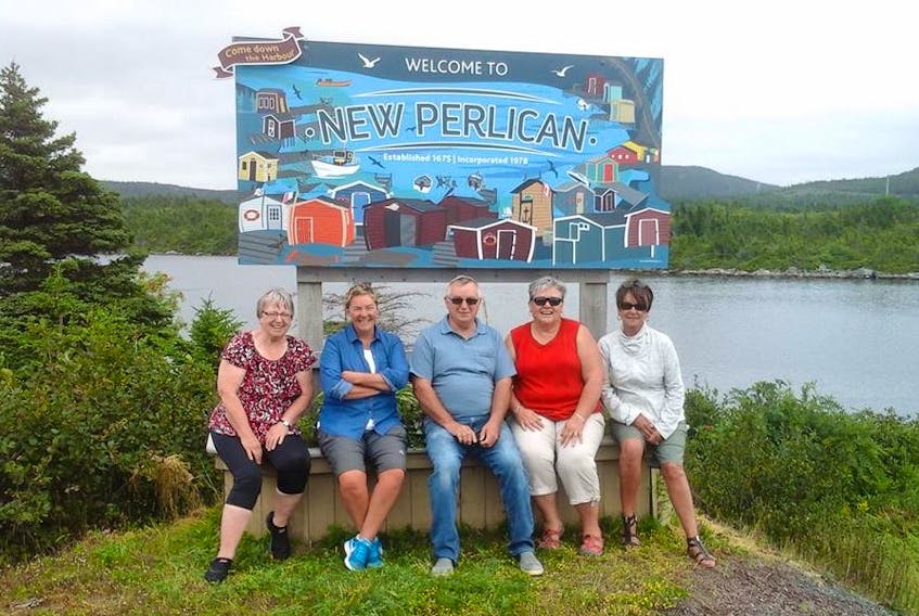 Pictured here with the new welcome sign are a few Heritage New Perlican members (l-r): Betty Simmons, Pelly, Robert O'Reilly, Eileen Matthews and Ruth Burridge. — Submitted photo