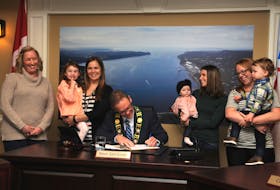 On hand for Tuesday’s proclamation signing for National Breastfeed Week in Holyrood were: Eastern Health lactation consultant Melissa de Leon, Avery Murray, public health nurse Rebecca Hurley, Mayor Gary Goobie, Annabelle Murray, Kerry Murray, Samantha Moss and Owen Moss.