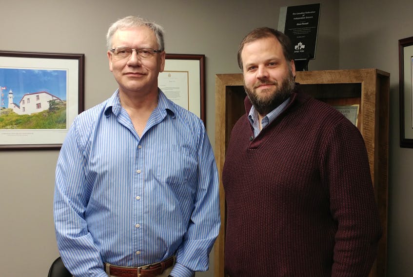 Dave Powell (left) and John Pritchett are optimistic about the future of Powell’s Supermarket’s presence in the region.