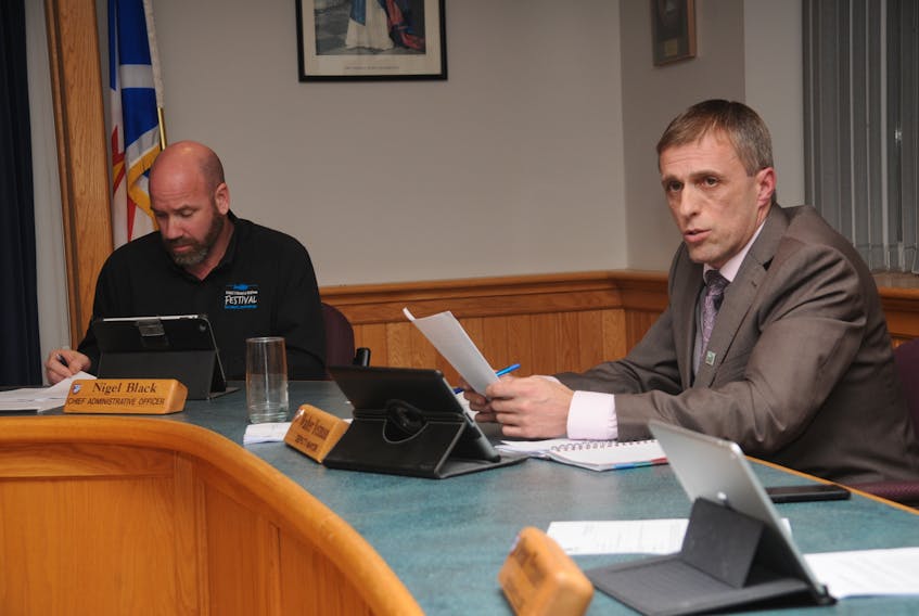 Deputy Mayor Walter Yetman, far right, delivered the Town of Bay Roberts’ budget for 2019 at the Tuesday, Dec. 11 council meeting. Seated next to Yetman is town CAO Nigel Black.