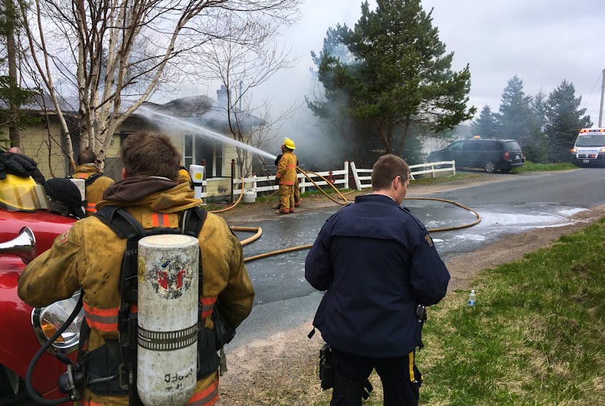 The Bay de Grave Volunteer Fire Dept. and Bay Roberts Volunteer Fire Dept. worked together Tuesday morning to fight a house fire in South River.