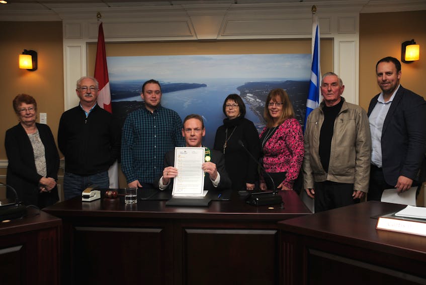 Pictured at the signing of a proclamation recognizing the Town of Holyrood’s 50th anniversary since incorporation are the town’s mayor and members of the committee planning for celebrations this summer, from left, Coun. Sadie King, Brian Tobin, Kyle Hawco, Mayor Gary Goobie, Brenda Cornick, Rosalie Healey, chair Gus Hawco and recreation and community events director Steve Martin. Missing from photo is Coun. Kim Ghaney.