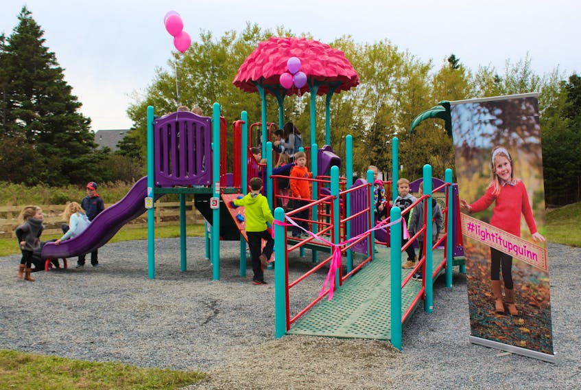 Dozens of children got to enjoy the newly opened playground on Woodcrest Estates.